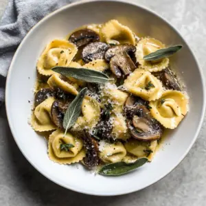 Cheese Tortellini with Butter, Mushrooms, and Crispy Sage